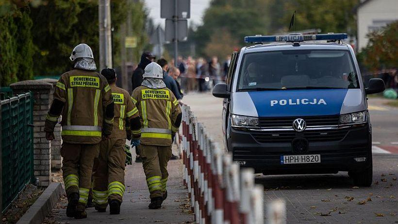 Police and other first responders at the scene where a 15-year-old fatally stabbed the caretaker of his former school and wounded two other adults at the John-Paul II primary school in Leszczydol-Nowiny, Poland, on 8 October 2026.