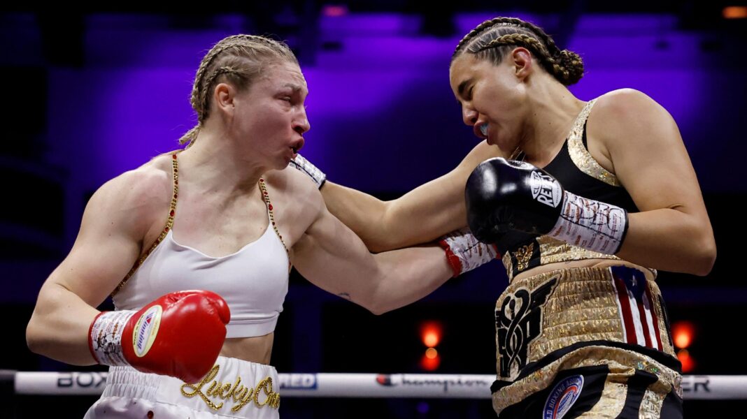 Price to defend world titles against Kotaskova on BBC Lauren Price (left) and Stephanie Pineiro Aquino exchange blows