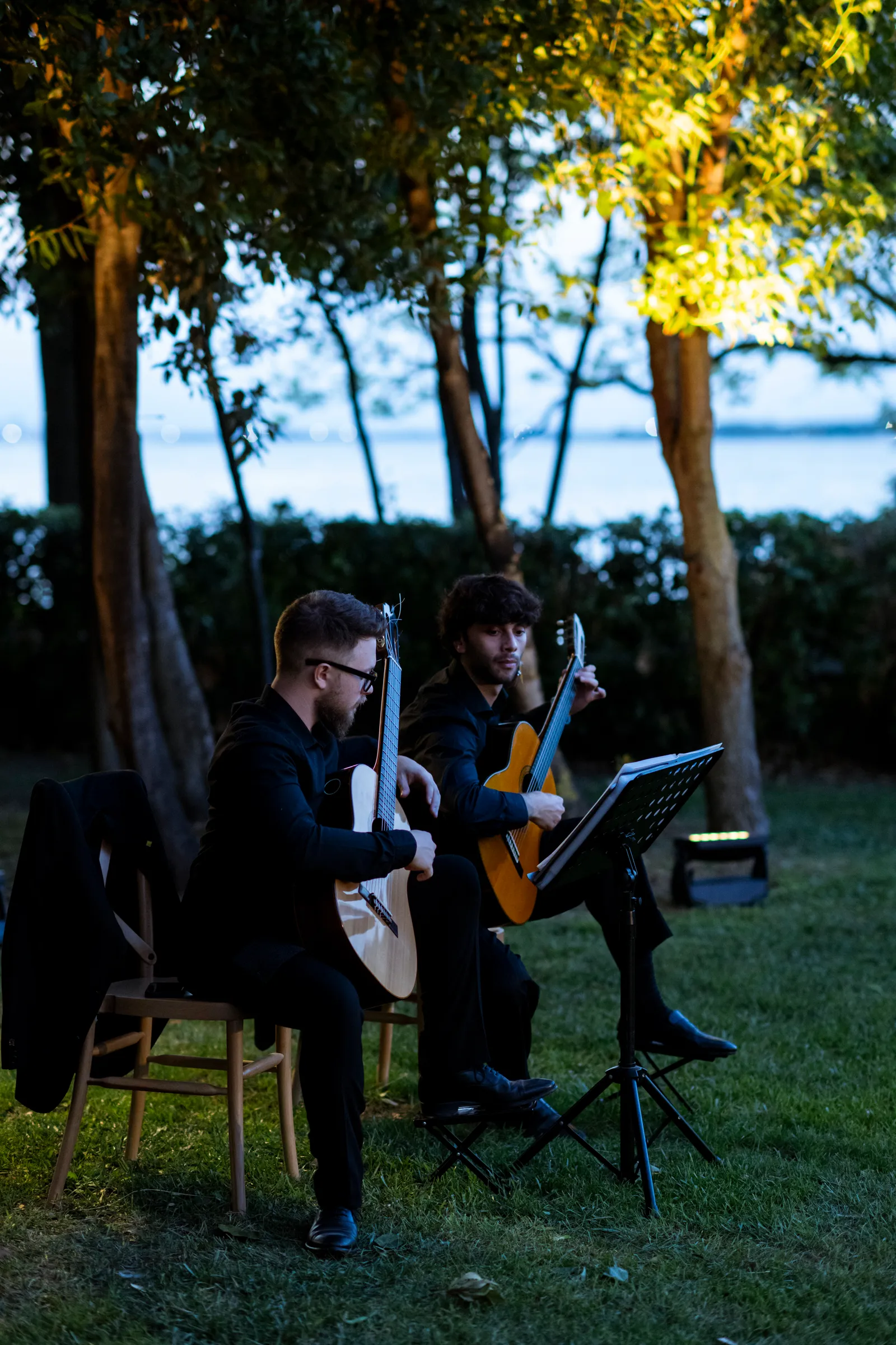 Image may contain Guitar Guitarist Leisure Activities Music Musical Instrument Musician Performer Person and Adult