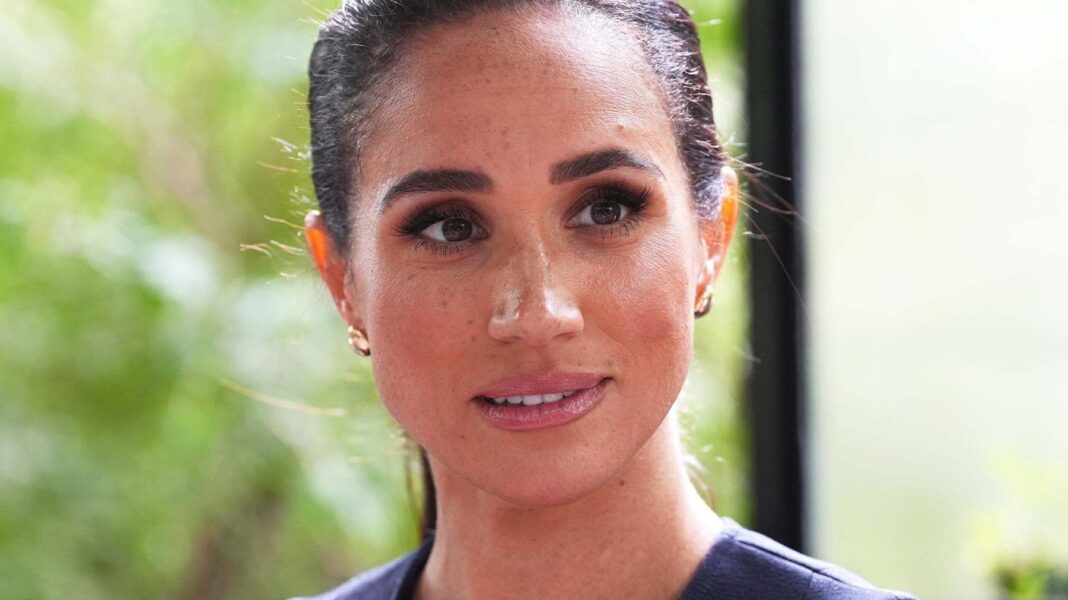 Meghan says she was informed about ‘disturbing allegations’ against her father in 2018 Meghan Markle has a ponytail and brunette hair.