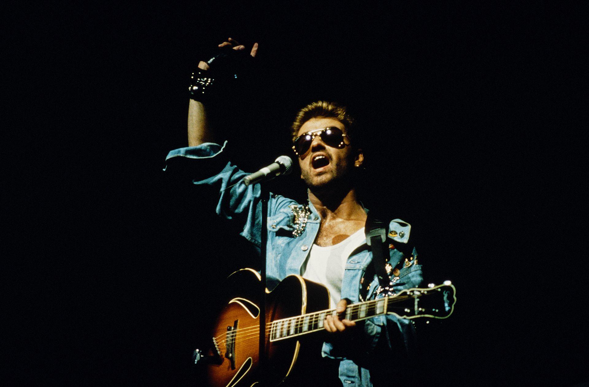 Singer and songwriter George Michael  performing on stage during the Japanese/Australasian leg of his Faith World Tour, February-March 1988.