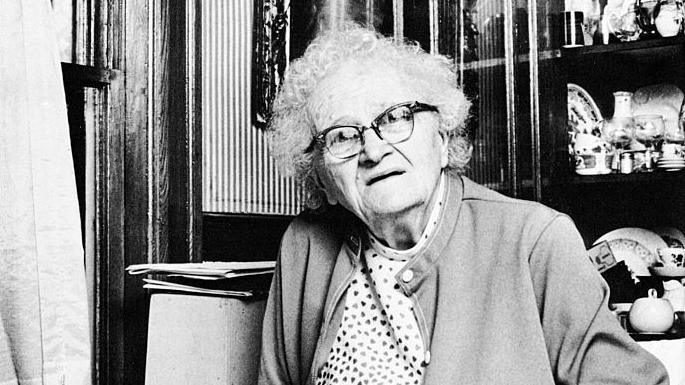 Portrait of British-born American astronomer & astrophysicist Cecelia Payne-Gaposchkin (1900 - 1979) seated at a table, Cambridge, Massachusetts, circa 1978