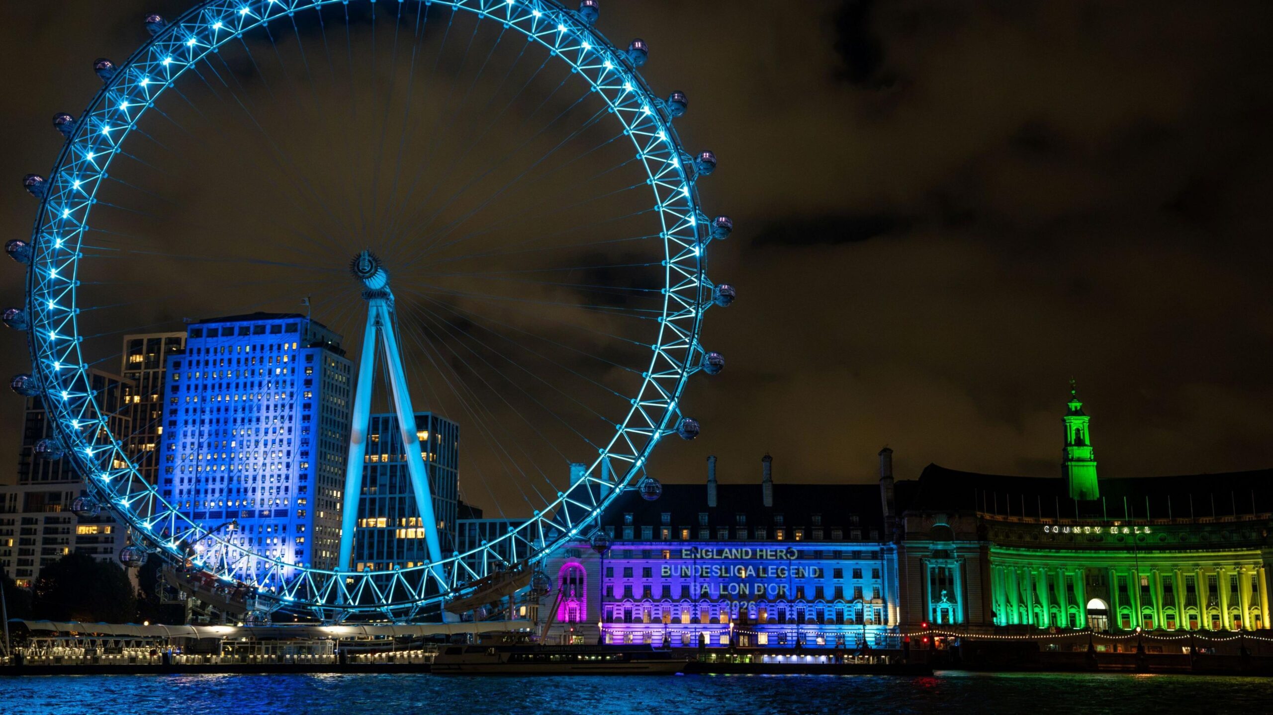 An image in London showing the words "England Hero, Bundesliga legend" being projected on a building