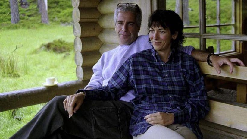 Epstein and Maxwell pictured sitting on a bench side by side