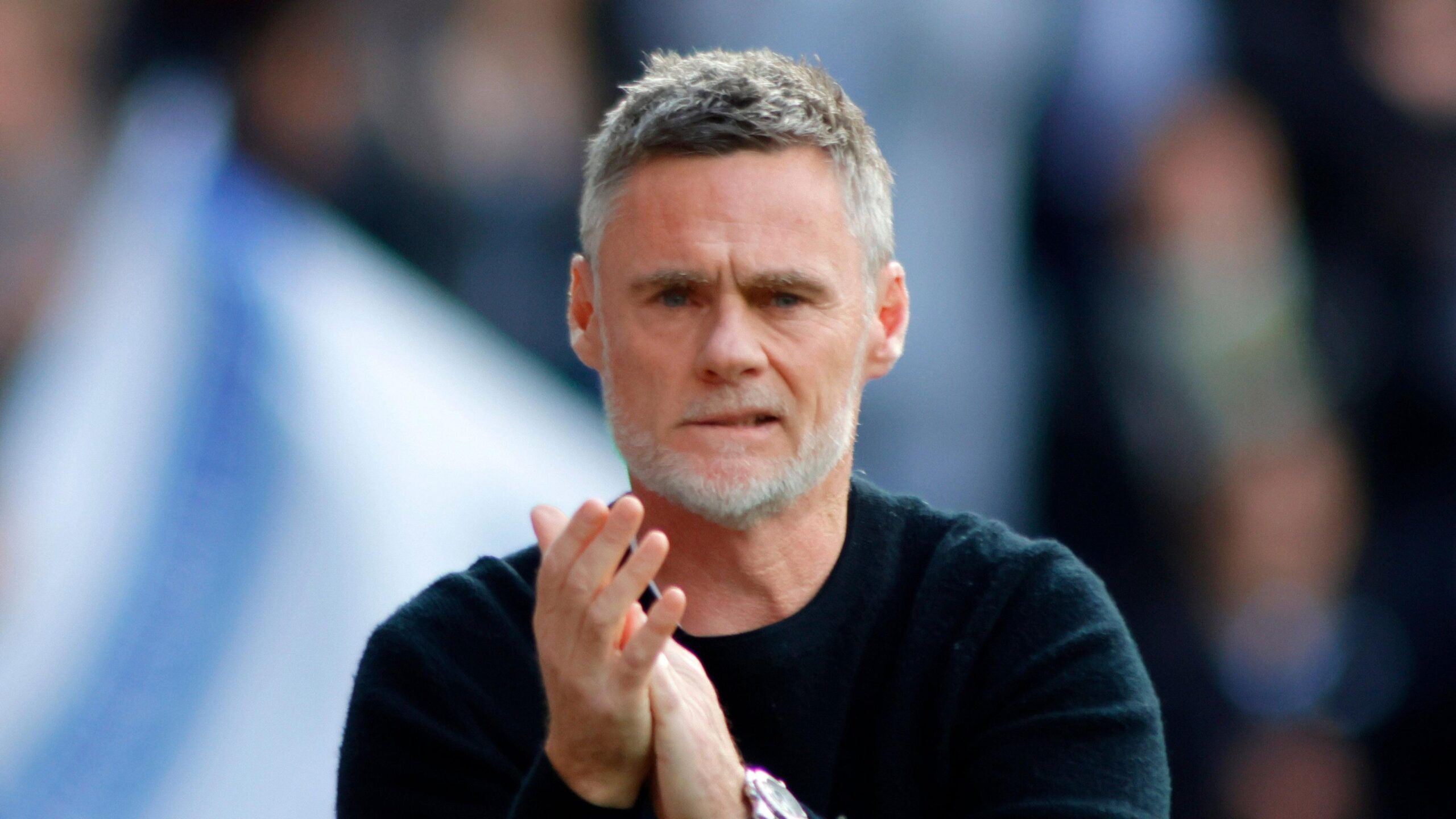 Graham Alexander claps the Preston fans ahead of the game with Millwall