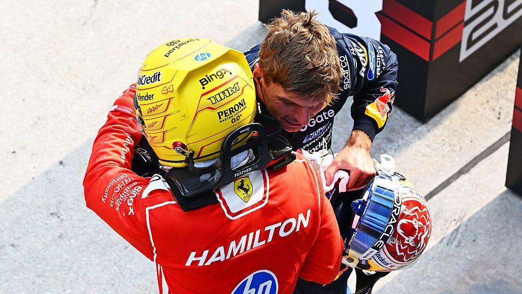 Lewis Hamilton and Max Verstappen share a hug after qualifying