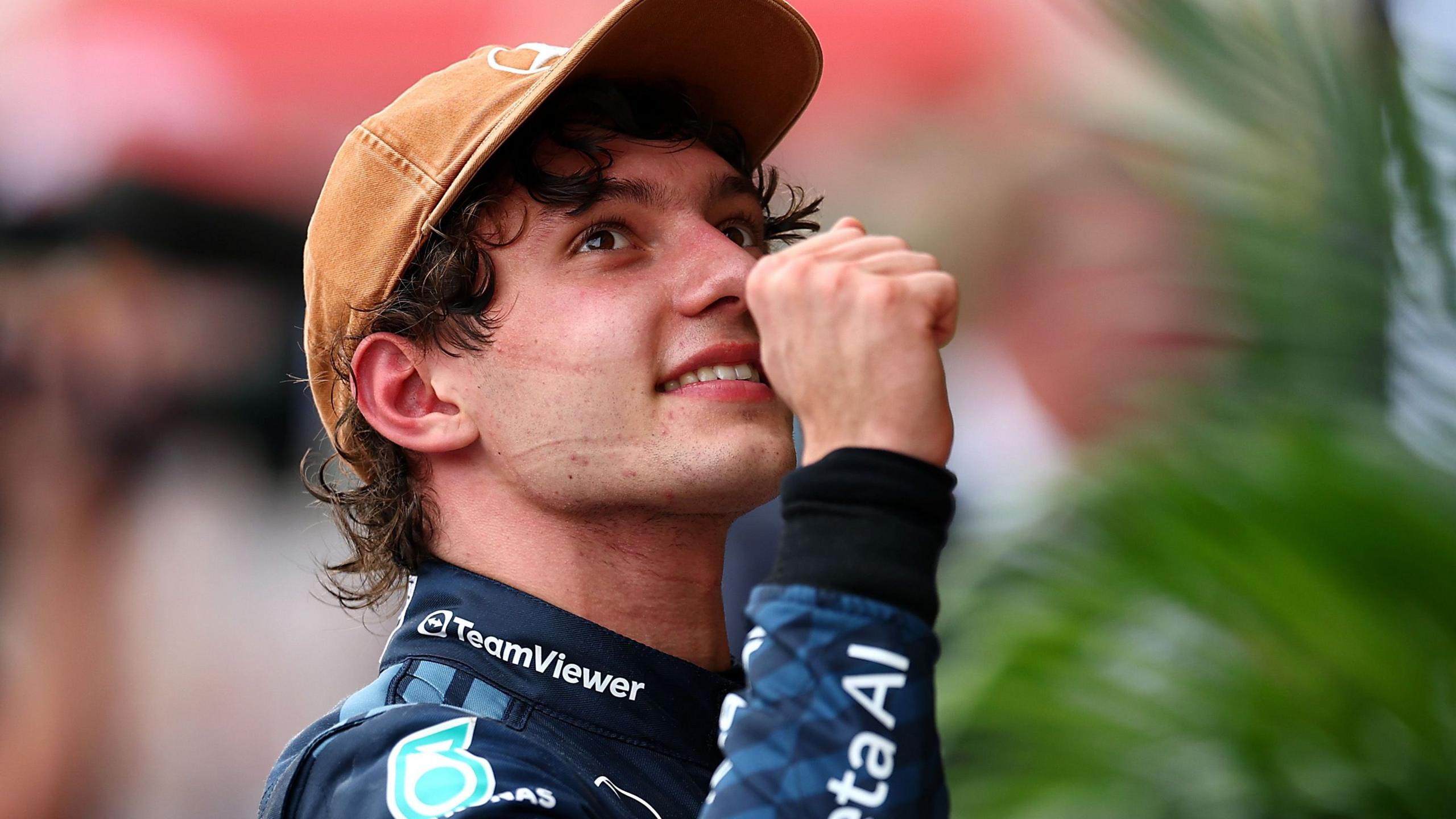 Mercedes' Kimi Antonelli looks up and clenches his fist in celebration after winning the US Grand Prix