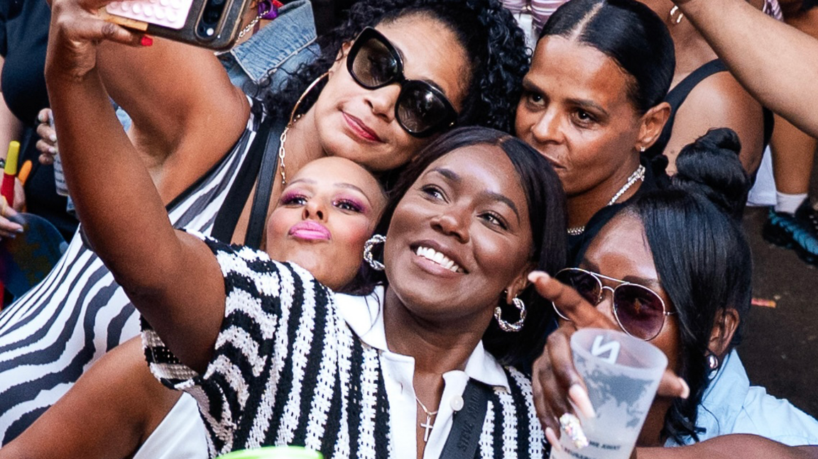A group of women smile as they take a selfie at an event at Lakota, Bristol.