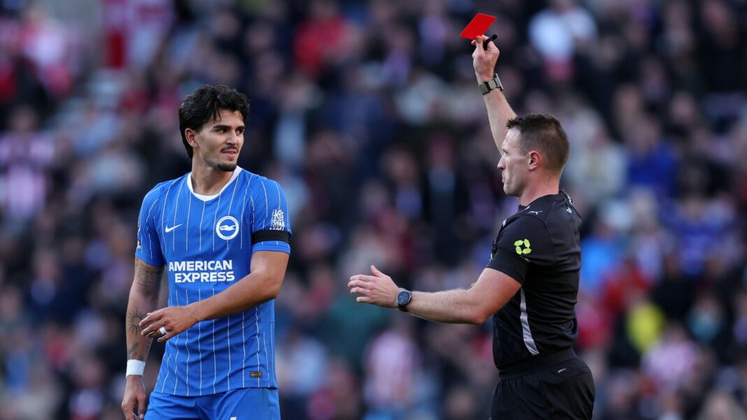 Pascal Struijk is shown a red card by referee Thomas Bramall