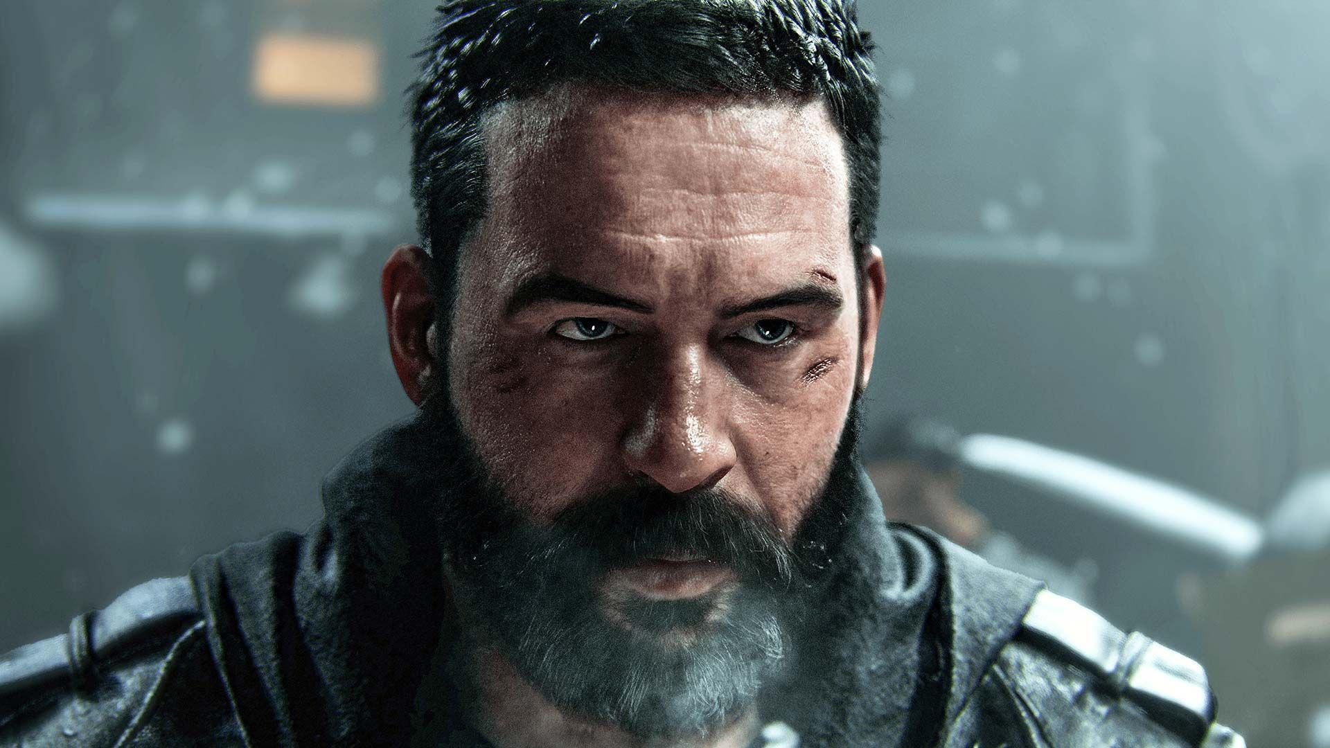 A character from Call of Duty Modern Warfare 4. The soldier has short dark hair and a beard with scars above his left eye. He has a serious expression as snow falls behind him in a darkened backdrop.