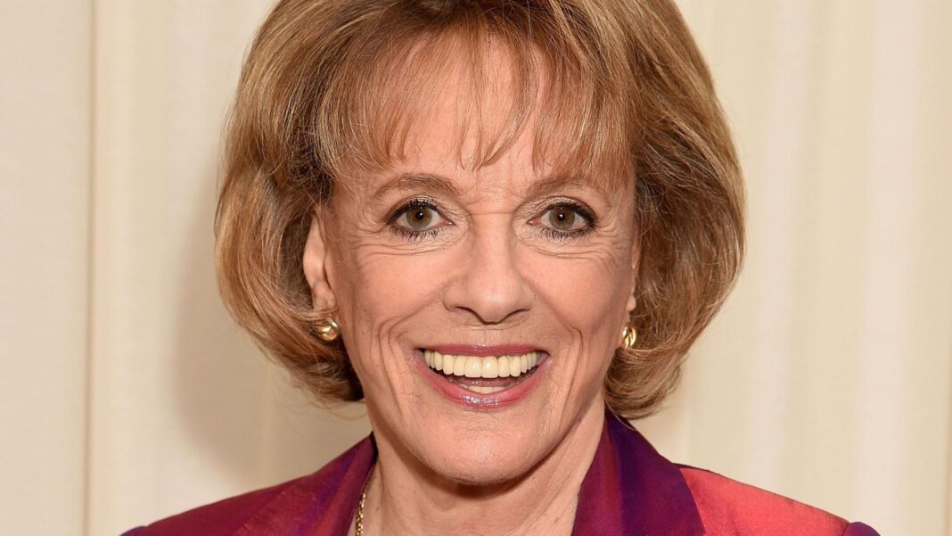 Dame Esther Rantzen in a red jacket smiling at the camera at the Pride of Britain Awards in 2016