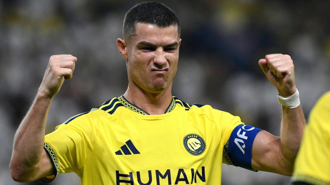 Ronaldo scores after match delayed by missile alert Cristiano Ronaldo celebrates his goal in the AFC Champions League, clenching both raised fists and scrunching up his face