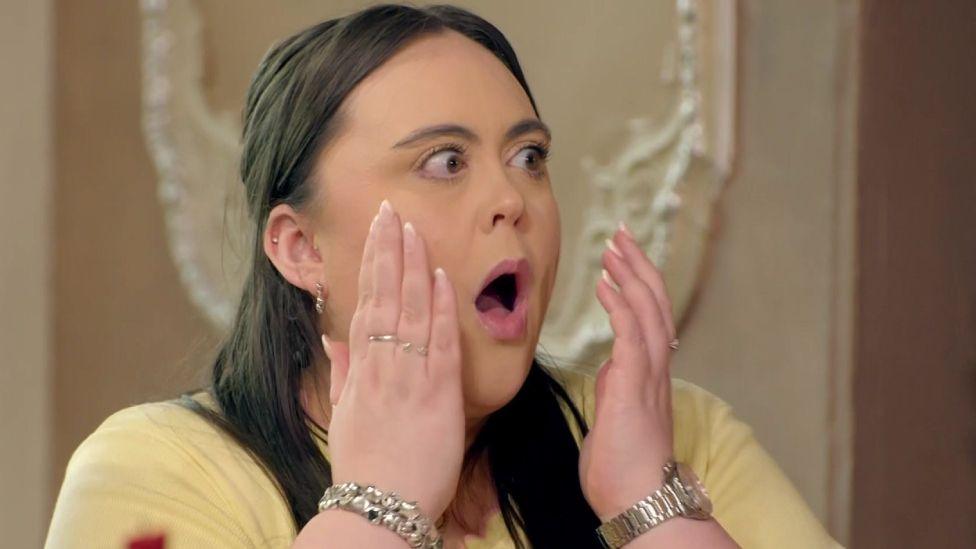 Sharon Rooney looking shocked in the breakfast room on Celebrity Traitors