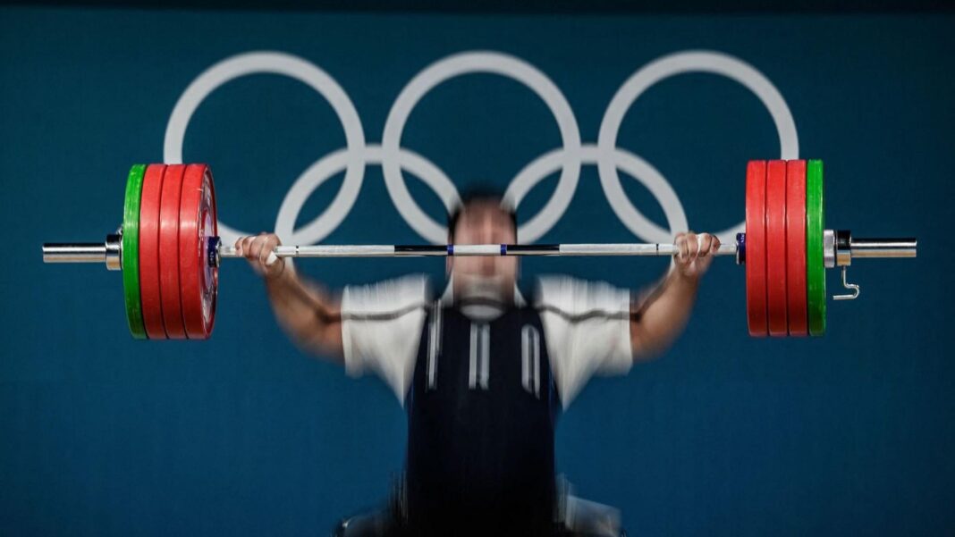 Russia to host first Olympic federation world event since Ukraine invasion A weightlifter at the 2024 Paris Olympics