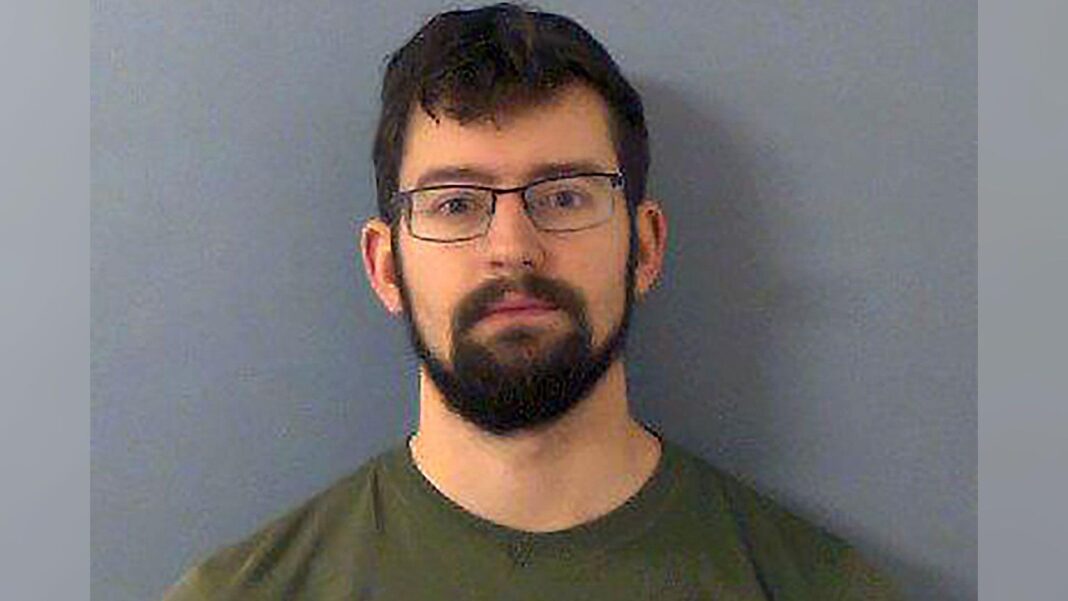 Supreme Court hears appeal over Maids Moreton murder Benjamin Fields wearing a green top and glasses in a mugshot photo. He has dark hair and a thick dark beard.