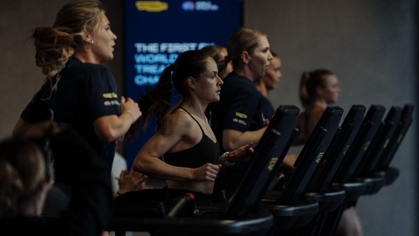 A general image of runners completing 5k runs on a treadmill at one of the Run X gyms