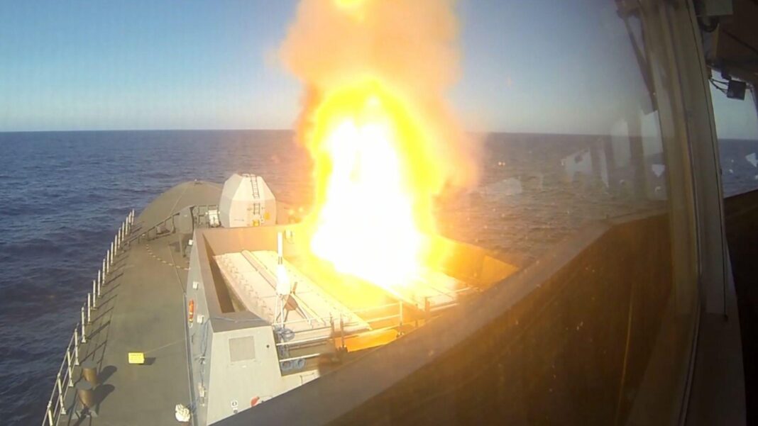 In a flash of fire and smoke, Type 45 destroyer HMS Diamond fires their Sea Viper Missile system