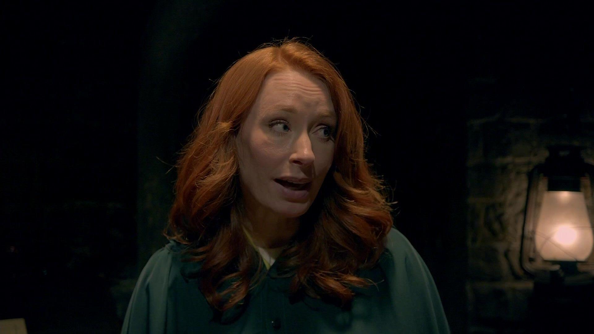Traitor Hannah Fry wearing a green cloak