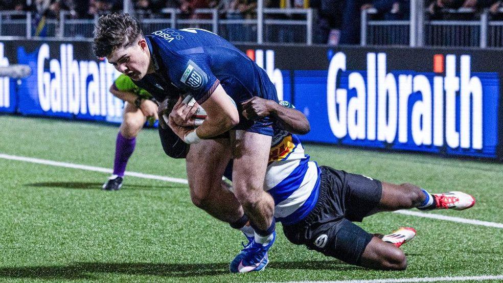 Rory McHaffie scores a try for Edinburgh