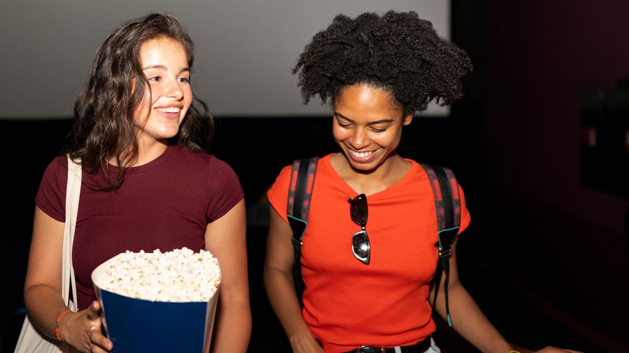 Two young women at the cinema