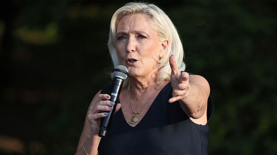 Marine Le Pen addresses an event in northern France in July.