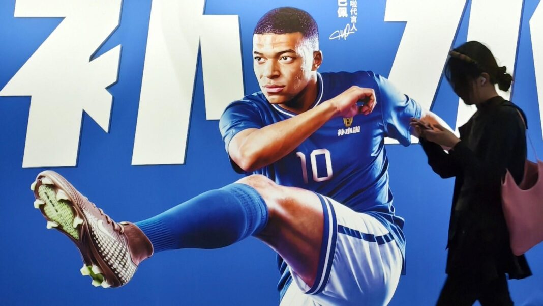 ‘Best thing is keep your mouth shut’ – Mourinho on Mbappe-Mao row Pedestrians pass by an electrolyte drink advertisement for French football player Kylian Mbappé in the subway in Shanghai, China on June 30, 2026