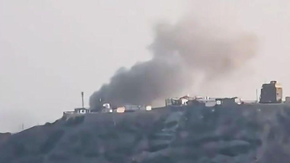 A screengrab of a verified social media video showing smoke rising from the presidential palace in Aden, southern Yemen, following a Houthi missile attack (15 October 2026)