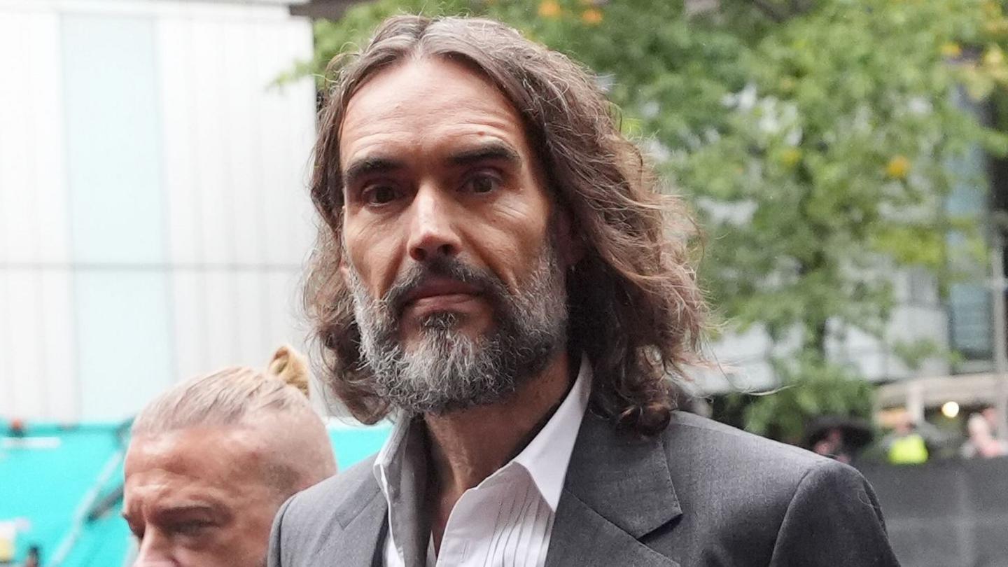 Russell Brand arriving at Southwark Crown Court, London, where he faces three charges of rape, indecent assault, and three counts of sexual assault, relating to six women. Picture date: Friday October 16, 2026.