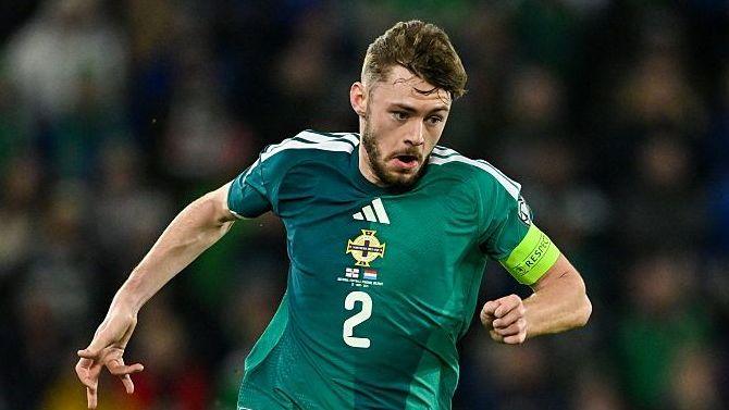 Conor Bradley in action for Northern Ireland