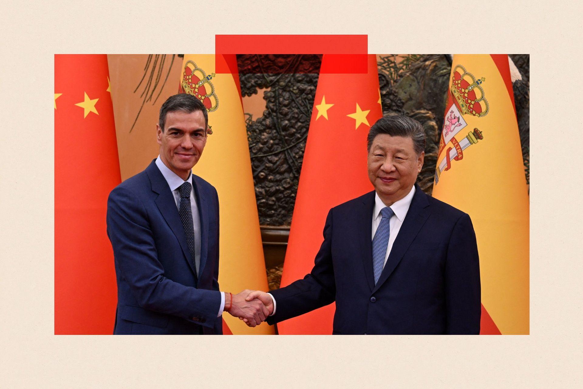 Pedro Sanchez and Xi Jingping shake hands with their country flags behind them. Both men are dressed in dark suits