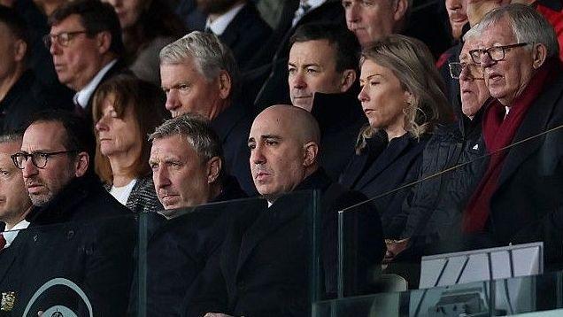 Manchester United executives, with Sir Alex Ferguson, watch the team in action at Leeds United from the stands