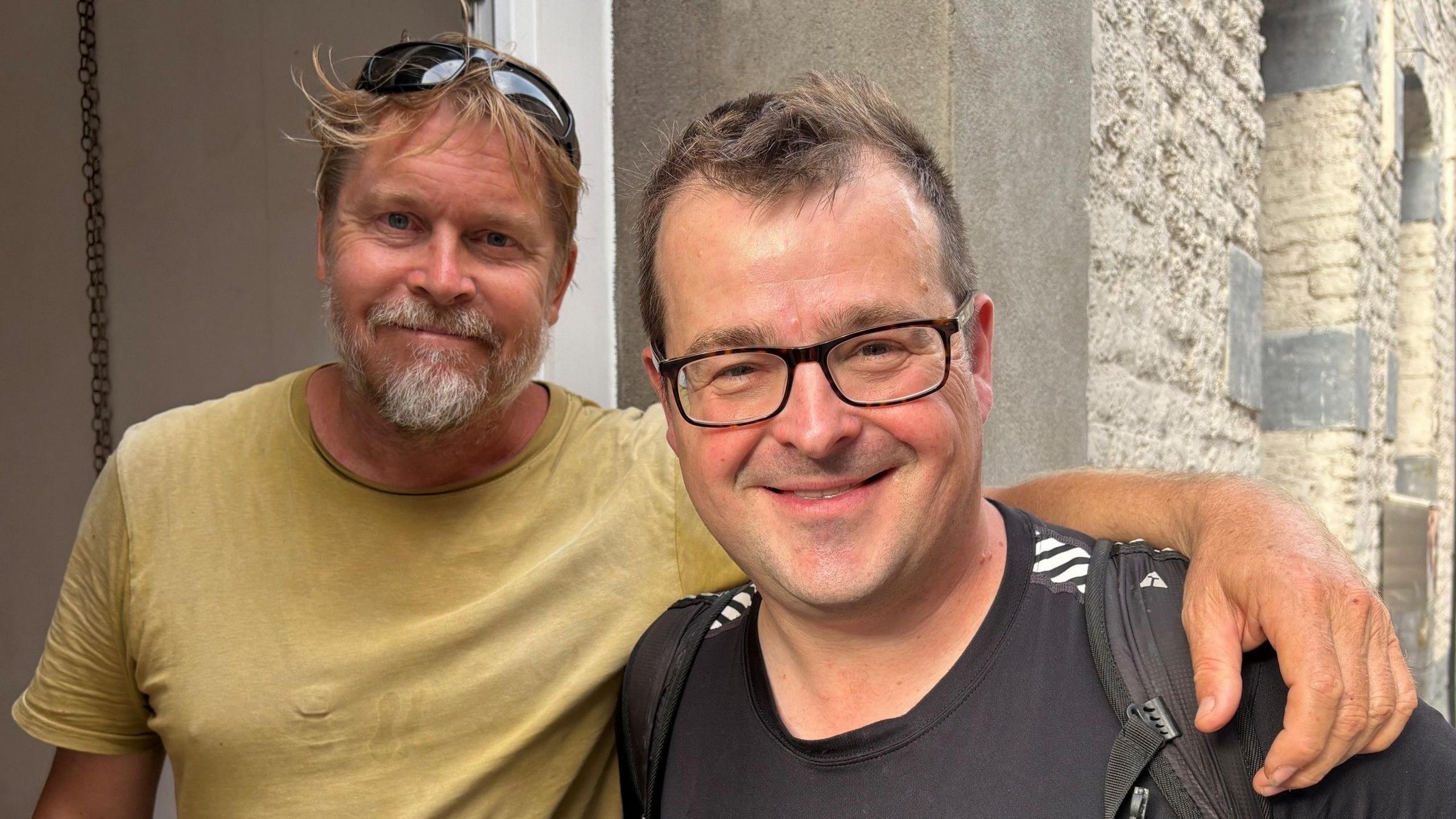 Global adventurer Karl Bushby places his arm on the shoulder of the BBC's Kevin Shoesmith