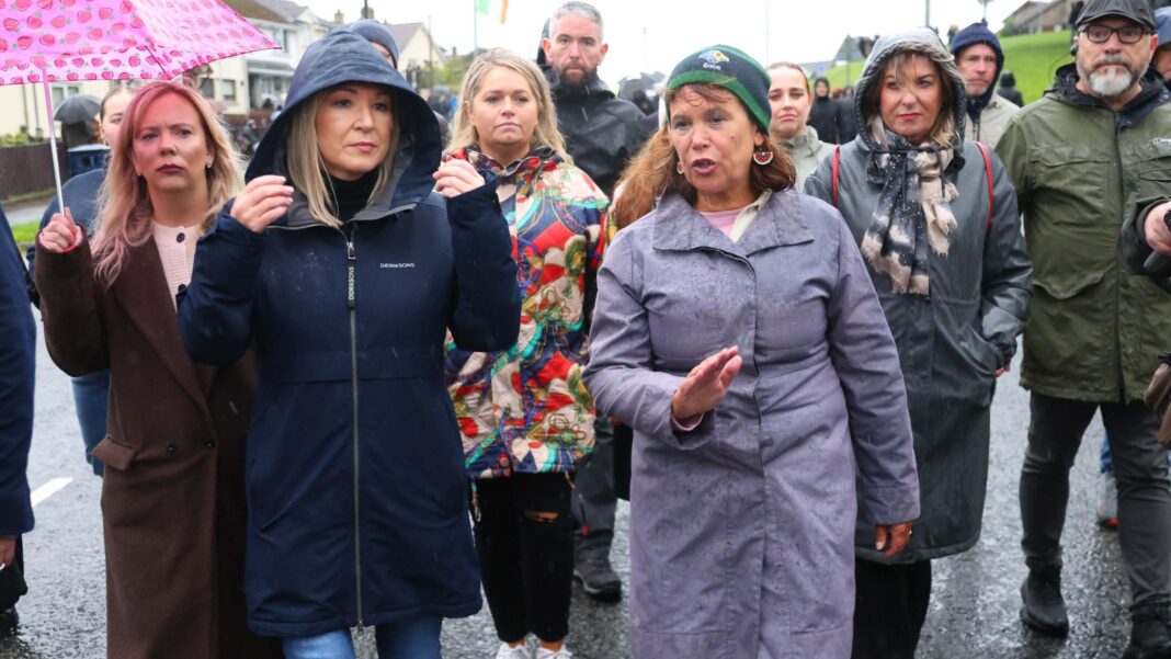 A group of people walking down the Garvaghy Road during a protest