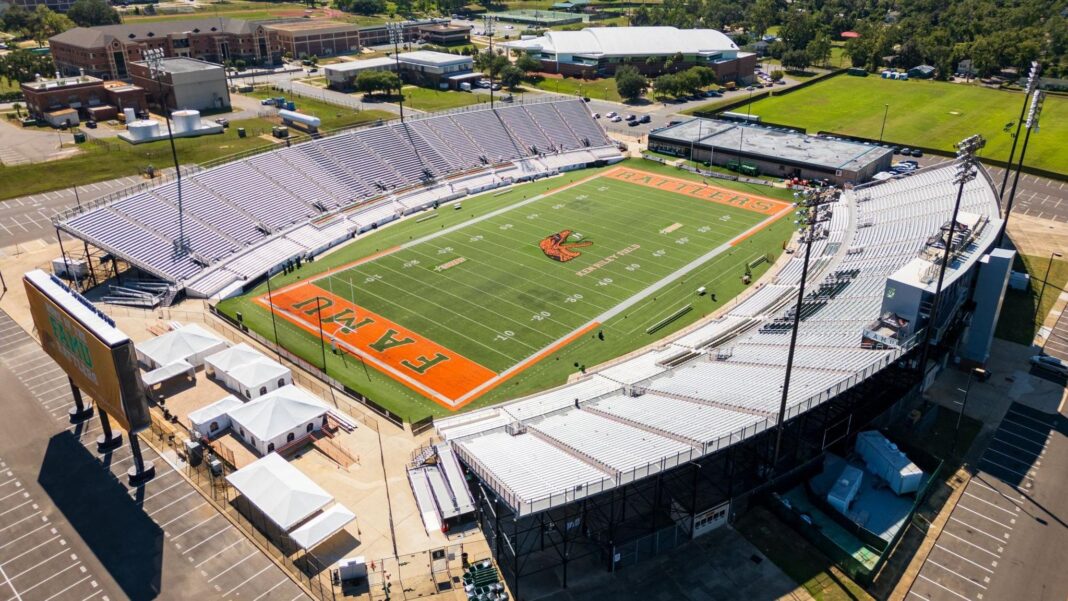 Police arrest teenager after shooting that injured 12, including children, in Florida A birds-eye view of an American football stadium