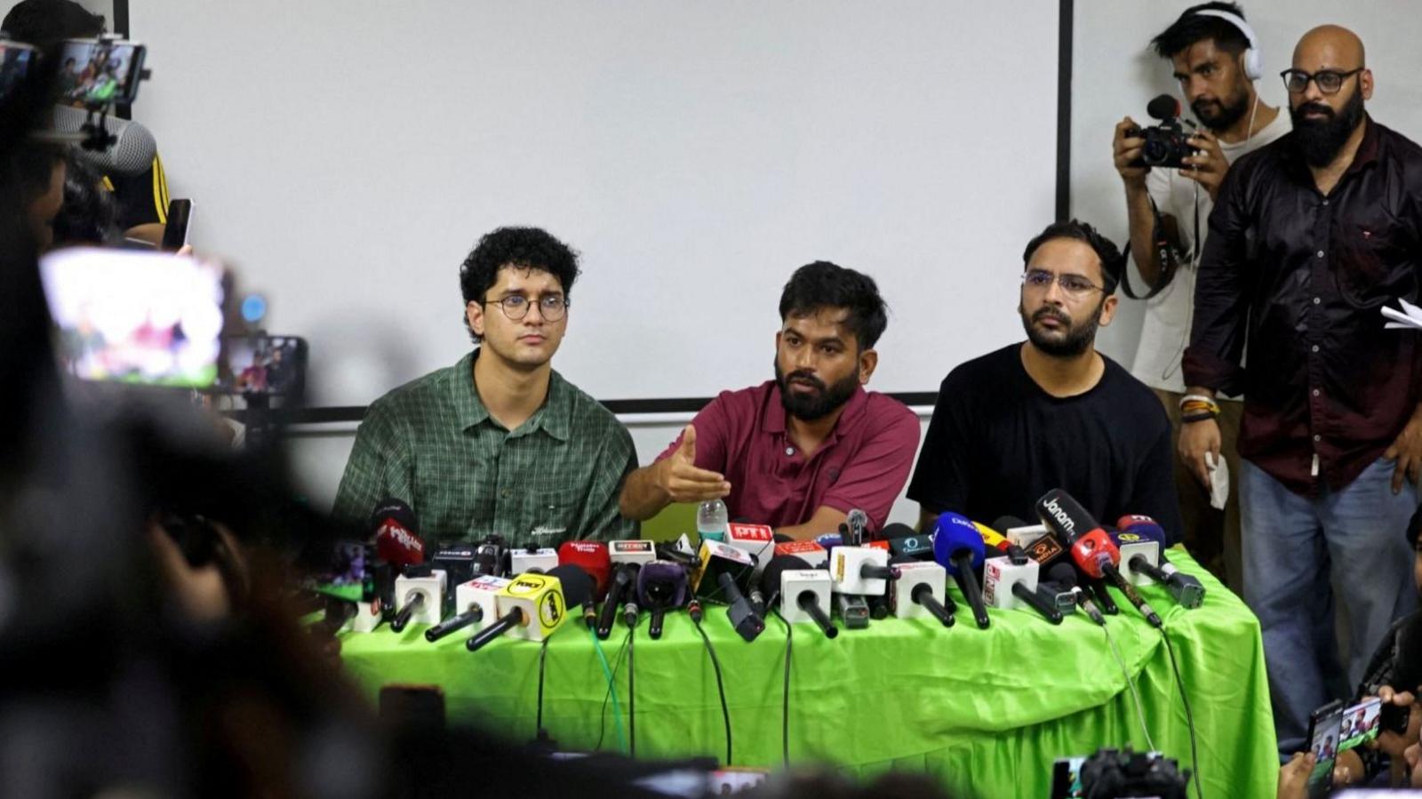 Abhijeet Dipke, head of the Cockroach Janta Party (CJP) speaks as the party's convenors Ashutosh Ranka and Saurav Das look on during a press conference to demand resignation of India's Chief Election Commissioner Gyanesh Kumar, in New Delhi, India, September 24, 2026. REUTERS/Bhawika Chhabra