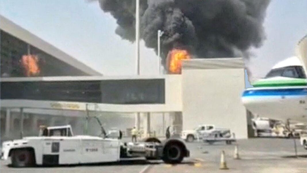 Twelve killed in attack on airport in Saudi capital Riyadh smoke and flames seen at King Khalid airport in Riyadh, 8 Oct