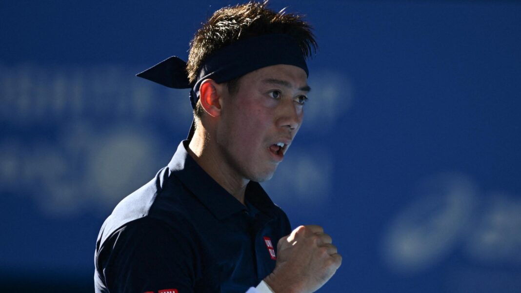 Kei Nishikori celebrates a point against Frances Tiafoe at the Japan Open