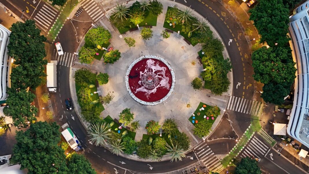 Israelis mourn 7 October attack victims three years after deadly Hamas raid A drone view of the water of the fountain at Dizengoff Square stained red to symbolise blood,