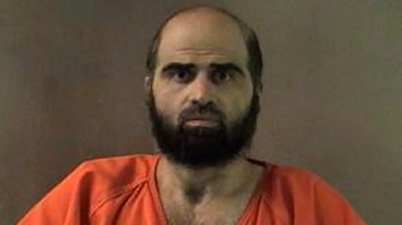An undated handout image of Hasan that was released by authorities in 2012