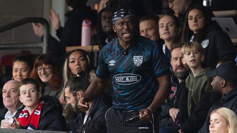 Dagenham And Redbridge investor KSI at a game