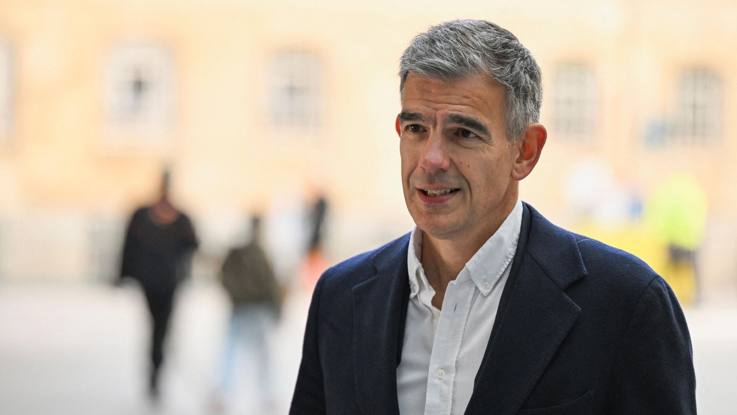 A headshot of Matt Brittin against a blurred background