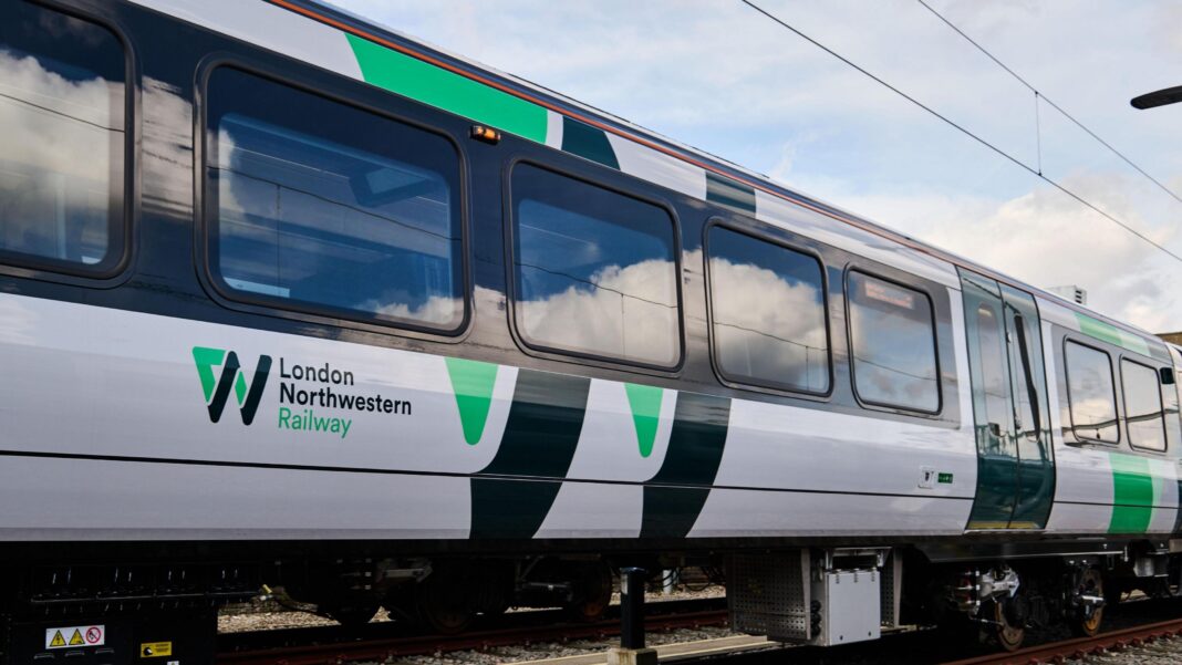 Birmingham Airport announces £2bn expansion A LNR train, with green and black writing, showing several train windows.