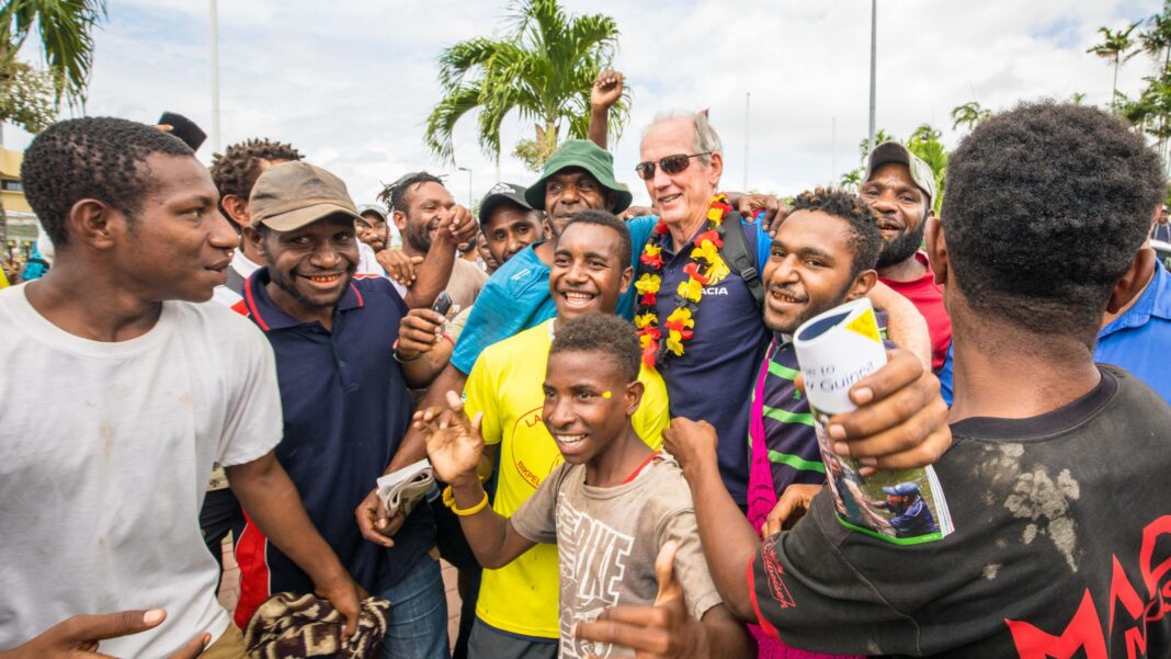 The World Cup co-hosts for whom rugby league is a national obsession Wayne Bennett being warmly welcomed by Papuan fans