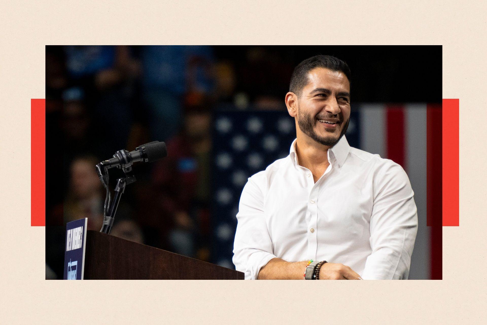 Abdul El-Sayed on stage wearing a white shirt