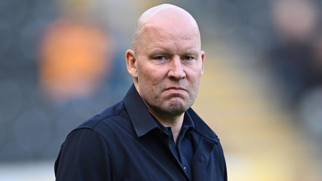 Sheffield Wednesday sack Pedersen after 15 months Henrik Pedersen, wearing a black jacket, looks straight-faced while on the touchline during Sheffield Wednesday's game at Hull City on 21 March