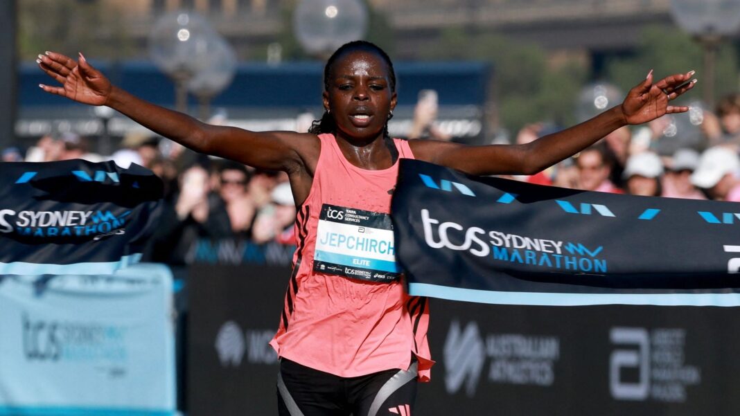 World champion Jepchirchir fails drugs test Peres Jepchirchir in a pink top with arms outstretched, breaking a ribbon as she crosses the finish line at the Sydney marathon