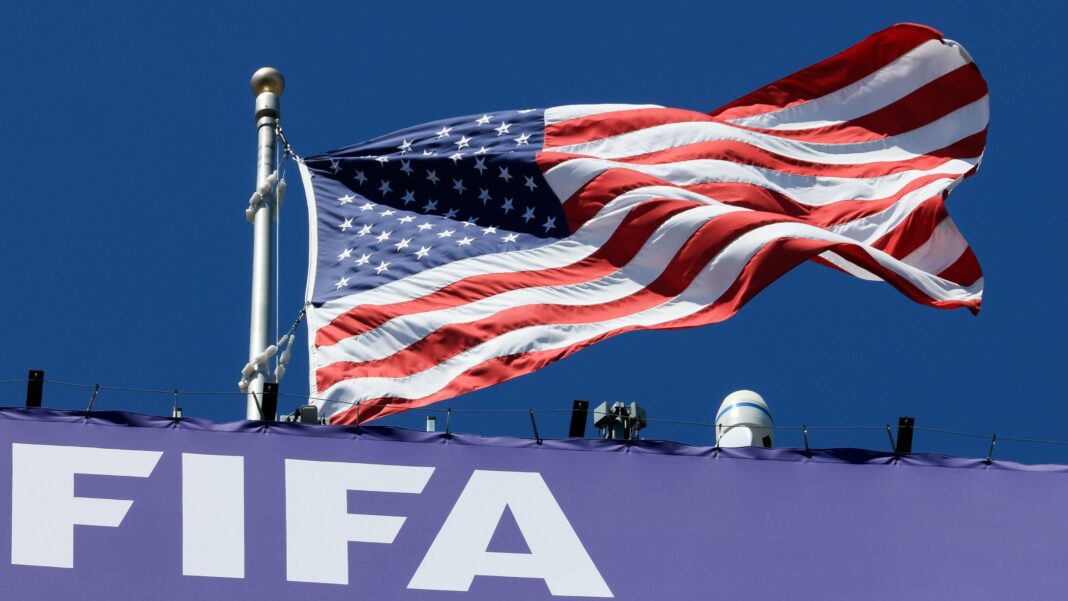 United States flag waves prior to kick-off at World Cup