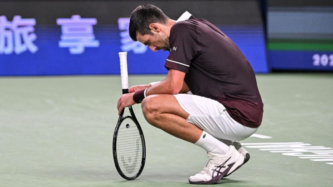 Djokovic suffers surprise Hurkacz loss in Shanghai Novak Djokovic crouches down as he recovers between points