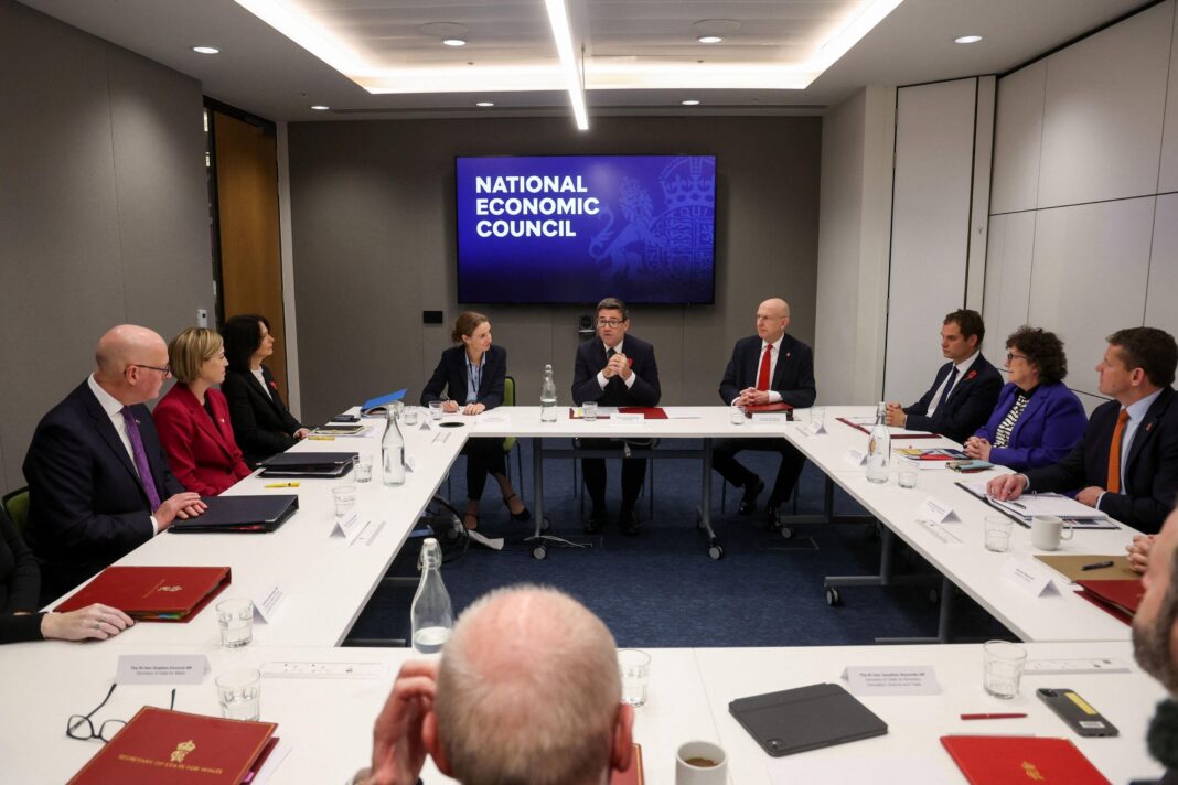 ‘No nation left behind’ says Burnham after meeting first ministers in Glasgow A group of officials sitting round a white desk with a TV screen in the background which reads "National Economic Council"