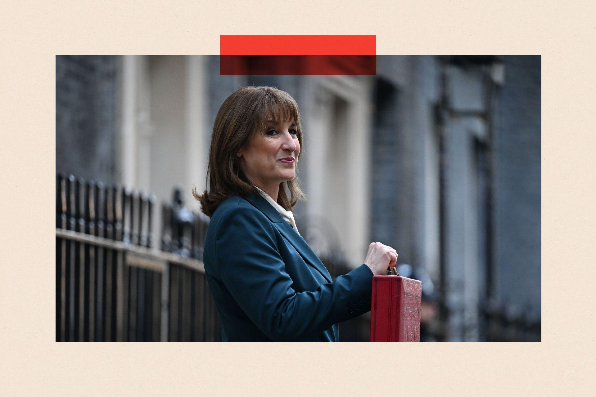A side on shot of Rachel Reeves posing with the red budget box in Downing Street